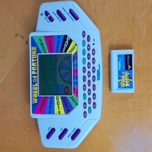 Vintage 1999 Tiger Wheel of Fortune hand held electronic game show game Tested